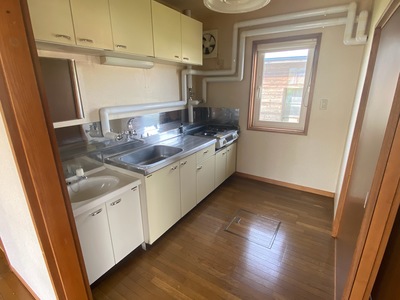 町有住宅（4号）のダイニングキッチンの写真